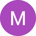 M C